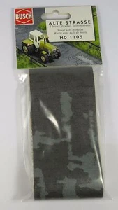 BRANDNEU IN VERPACKUNG OO / HO BUSCH 1105 STRASSE / STRASSE MIT SCHLAGLÖCHERN (SELBSTKLEBEND 1m x 66mm) - Bild 1 von 2