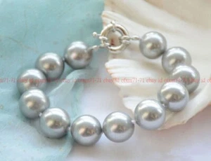 BRACCIALI BRACCIALETTI ORIGINALI 10MM GRIGIO ARGENTO ROTONDI CONCHIGLIA MARE SUD PERLE 8" - Foto 1 di 6