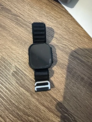 Apple Watch Ultra 2 49mm GPS+Cell Titanium Case w Black Ocean Band MX4P3LW/A - Image 1 of 3