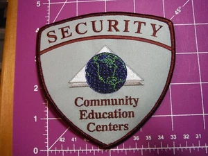 Parche de seguridad de centros de educación comunitaria NJ - nuevo - Imagen 1 de 2