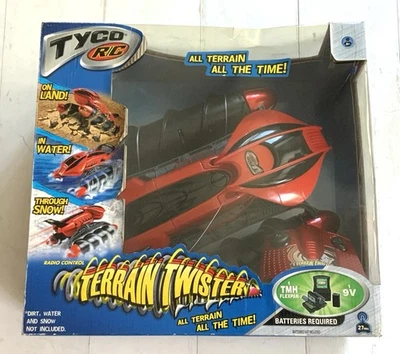 2004 Tyco R/C TERRAIN TWISTER Land,water & Snow All Terrain All The Time Orange - Image 1 of 4