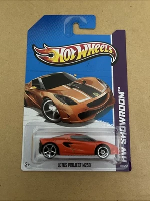 HOT WHEELS LOTUS PROJECT M250 ORANGE 2013 LONG CARD HW SHOWROOM - Image 1 of 2