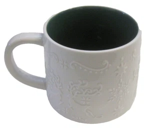 Lindt & Sprungli White Ceramic Embossed 3-D Reindeer Mug Green Interior RARE - Picture 1 of 7