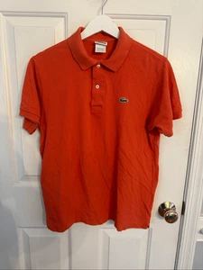 Lacoste orangefarbenes Poloshirt 4 oder Größe US Small gebraucht, in einwandfreiem Zustand - Bild 1 von 7