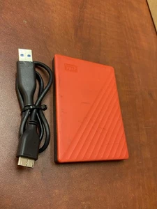 WD My Passport 2TB, External, 2.5" (WDBYVG0020BRD-WESN) Red Hard Drive - Afbeelding 1 van 7