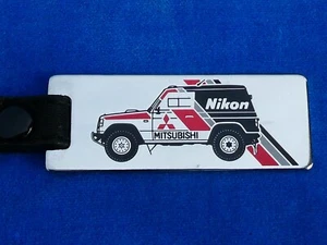 RARE TOP++ KEY RING - PARIS-ALGIERS-DAKAR 1985 MITSUBISHI M. PAJERO - Picture 1 of 4