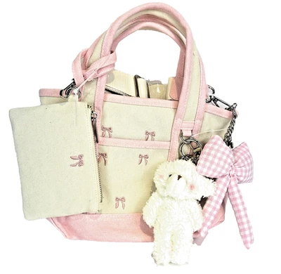 NUEVO Bolso de Mano Madden Girl Rosa Mini Lona Diseño de Arco Oso de Peluche Dije Cartera Foto 1 de 4