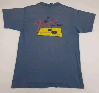 Camiseta De Colección Años 90 Fender Estampado Guitarras Finas De Colección Música Hecha en EE. UU. Rara Azul Desteñida Foto 1 de 4