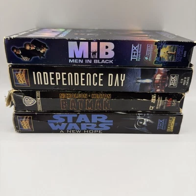 Lot of 4 VHS MOVIES INDEPENDENCE DAY MEN IN BLACK BATMAN STAR  WARS NEW HOPE - Image 1 of 4