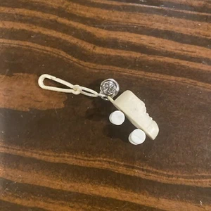 Vintage 1980 Plastic Bell Charm Cream ROLLING Shoe Skate For 80s Charm Necklace - Picture 1 of 4