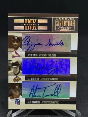 2005 Donruss Signature Series Ozzie Smith Cal Ripken Jr. Alan Trammel Auto Trio - Image 1 of 3