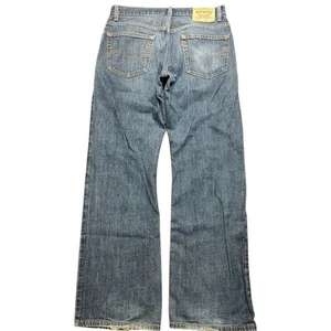 Pantalones de mezclilla Levis 557 de colección azul lavado medio corte bota relajado holgado Y2K para hombre 32x32 (32x31) - Imagen 1 de 17