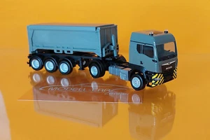 Herpa 318341 MAN TGS TM Abraumcontainer-SZ grau/gelb 1:87 NEU Modellauto - Picture 1 of 2