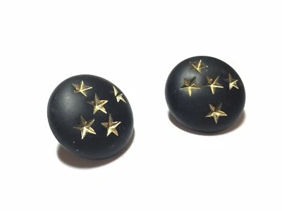 Aretes retro con botones estrellas negras y doradas Foto 1 de 4