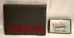 1991 Pontiac Grand Am Owners Manual in Vinyl Case with Cassette Tape - Picture 1 of 13