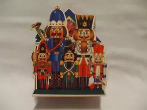 Caja de música Cascanueces San Francisco bebés en Toyland adorno musical de Navidad - Imagen 1 de 9