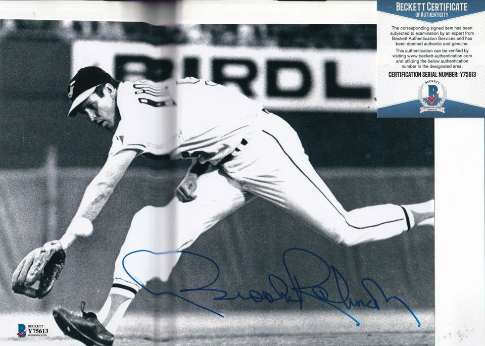 BROOKS ROBINSON signed (BALTIMORE ORIOLES) baseball 8X10 photo BECKETT Y75613 - Image 1 of 1