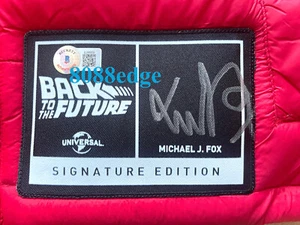 "MICHAEL J FOX" SIGNED OFFICIAL BACK TO THE FUTURE/McFLY VEST AUTO AUTOGRAPH BAS - Bild 1 von 8