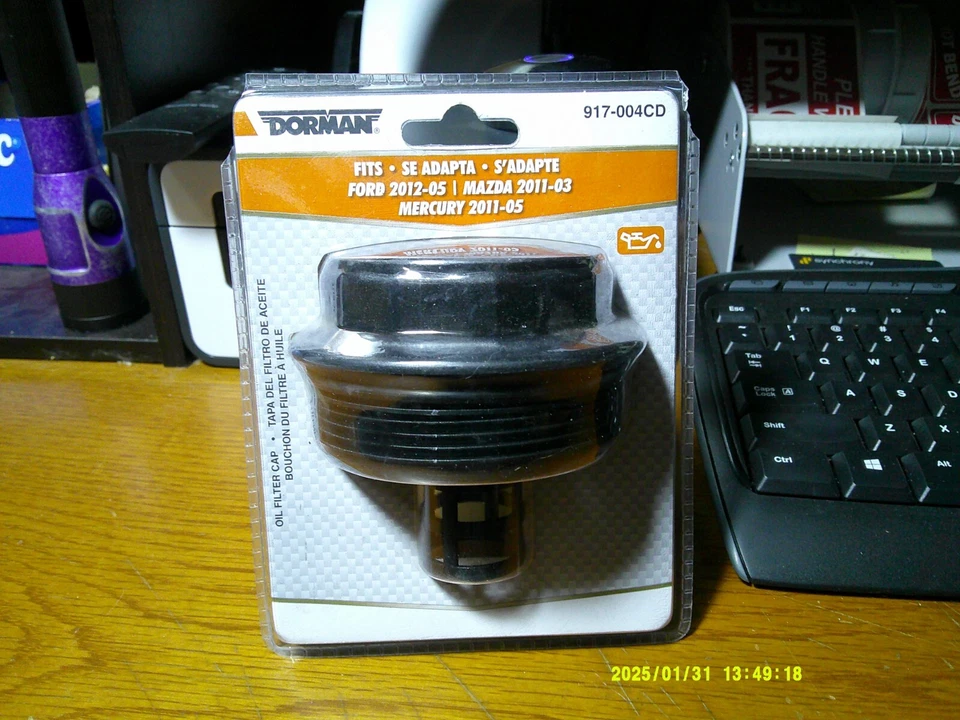 Tapa de carcasa de filtro de aceite Dorman 917-004CD para algunas aplicaciones Ford, Mazda y Mercury. Foto 1 de 1