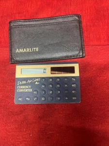 VINTAGE DELTA AIRLINES CURRENCY CONVERTER CALCULATOR (k5) - Picture 1 of 5