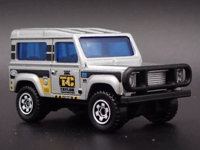 1984-1990 Land Rover 90 Taylor Costruzione 1/64 Diorama Scala Modellino Auto - Immagine 1 di 4