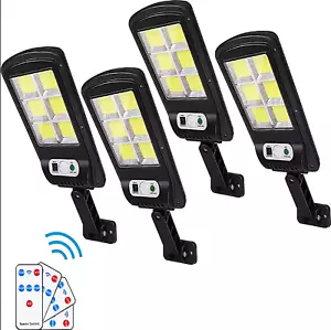 4X FARETTI DA ESTERNO CON LUCI LED FARETTO PANNELLO SOLARE SENSORE DI MOVIMENTO - Foto 1 di 7