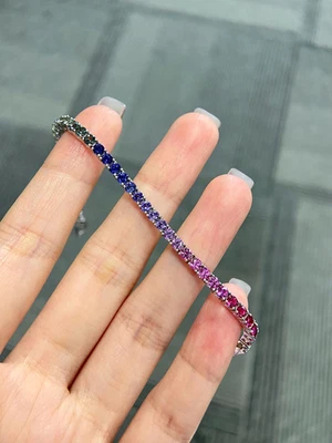 Brazalete Tenis Zafiro Arco Iris Creado en Laboratorio Corte Redondo 5TCW Oro Blanco 14k Sobre Foto 1 de 4