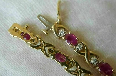 Brazalete de tenis para mujer de 7" con rubí y diamantes de corte ovalado de 9 quilates enchapado en oro amarillo de 14 quilates Foto 1 de 4