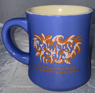 Auténtica taza de café azul Rainforest Café 1999 un lugar salvaje para comprar y comer de colección Foto 1 de 4