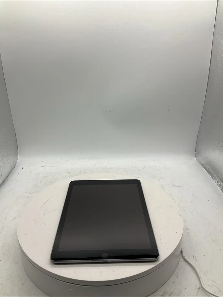 Apple iPad (6th Generation) A1954 32GB Good Condition, Gray, UNLOCKED Scuff Body - Image 1 of 4