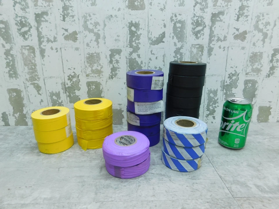 24 NEW Standard Flag Tape Yellow, Purple, Black, Blue/White, Lilac 1 3/16 x 300' - Image 1 of 1