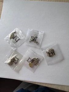(5) Dijes internacionales de diamantes nuevos en bolsas originales - Imagen 1 de 6