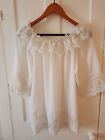 A Ladies White Off The Shoulder Blouse One Size