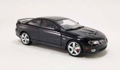 GMP ACME 1:18 2006 PONTIAC GTO PHANTOM BLACK WITH BLACK INTERIOR NEW 18989 - Image 1 of 4