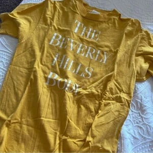 T-shirt grafica punto singolo vintage Giorgio Beverly Hills "THE BEVERLY HILL BODY" - Foto 1 di 4