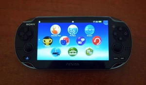 Sony PlayStation PS Vita  - Fab games machine! OLED, WiFi. FREE Fast Post! - Picture 1 of 5