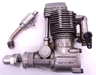 O.S FS 40 4 STROKE GLO ENGINE WITH EXHAUST AND GLO PLUG IN GOOD CONDITION - Image 1 of 4