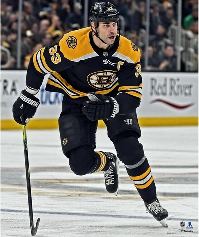 Zdeno Chara Boston Bruins Unsigned Vertical Black Jersey Skating Photograph Cover