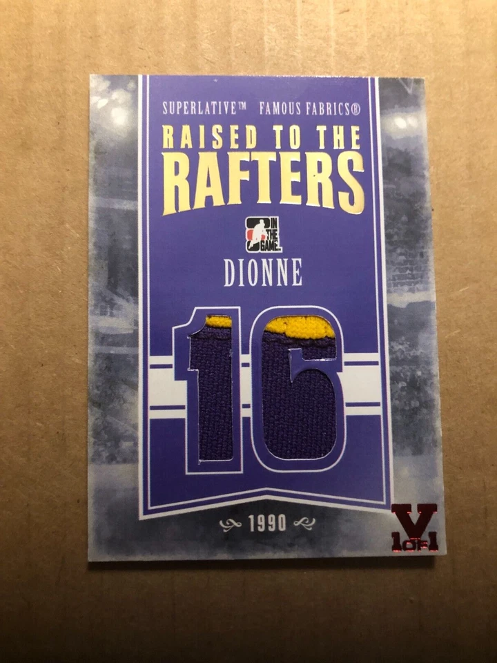 12-13 ITG Superlative Famous Fabric Raised to the Rafters Gold Marcel Dionne 1/1 - Image 1 of 2