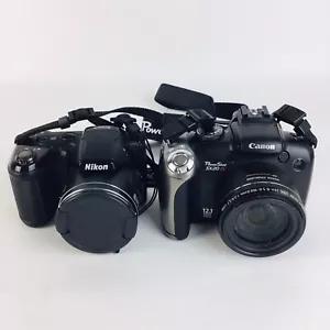 2 Digital Cameras Parts Or Repair Canon PowerShot SX20 IS & Nikon Coolpix L810 - Picture 1 of 4