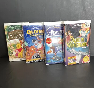 Disney VHS Oliver & Co. , Alice In Wonderland, Rescuers, & W. Pooh Lot of 4 - Image 1 of 4