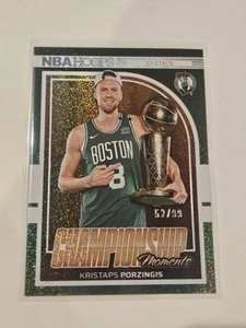 2024-25 Panini NBA Hoops - Kristaps Porzingis #4 Championship Moments /99 - Picture 1 of 2