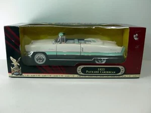 Modellino auto ROAD SIGNATURE * 1955 PACKARD CARIBBEAN * 1:18 * bianco/verde * IMBALLO ORIGINALE - Foto 1 di 9