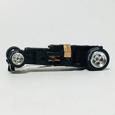 Auto World 4 Gear Chassis, Chrome Wheels, Good Year Tires, Brand New - Image 1 of 4