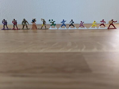 Juego de 12 figuras Power Rangers Jada Toys - Mighty Morphin Heroes & Villains Mini Foto 1 de 4