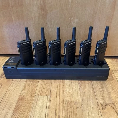 Six Motorola SL 300 VHF 99 Channel Radios 136-174 MHz FM. W/ 6-dock Charger - Image 1 of 4