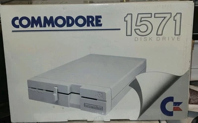 Unidad de disquete Commodore 1571 para C64 64C VIC-20 C128 C16 PLUS/4 IOB con guía del usuario Foto 1 de 4
