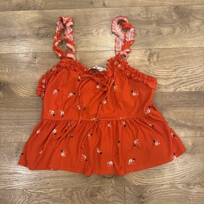 Camiseta sin mangas Lily blanca roja floral con volantes Peplum crop elástica - talla 1X Boho Foto 1 de 4