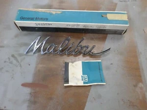1964 chevrolet malibu nos rear quarter panel "MALIBU' emblem 3853534 - Picture 1 of 4