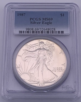 1987 PCGS MS69 - 1 oz Silver American Eagle, yellow toned - Image 1 of 2